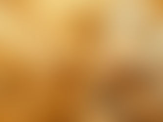 Close-up of a ginger cat with green eyes