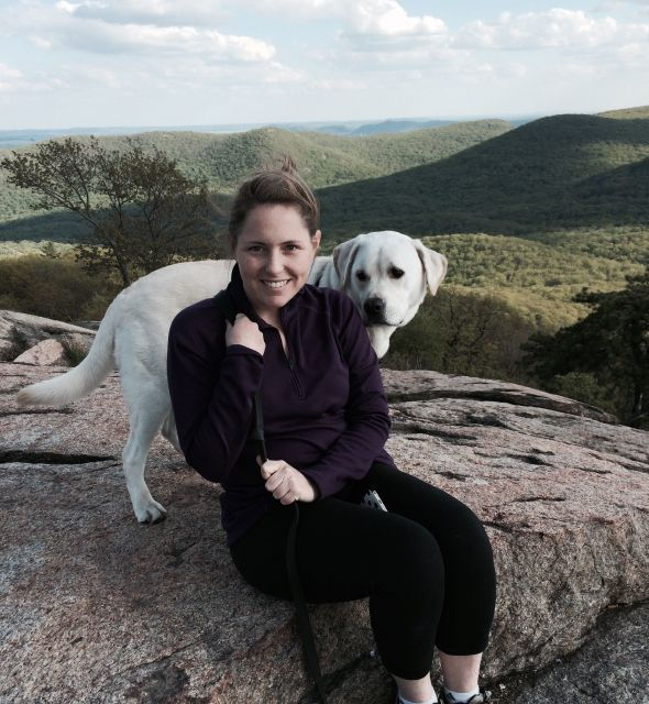 Portrait of Molly and her dog in the mountains